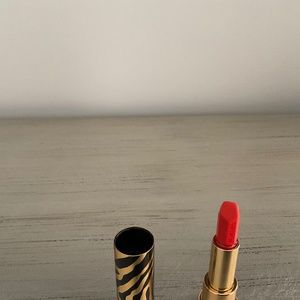 Sisley Paris lipstick in 31 orange alcapulco